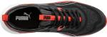 Preview: The shoe is sporty and has a black upper with red accents. The laces are black, and the Puma logo in orange is visible. The sole is light and textured.