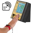 Preview: The image shows a device with a touchscreen that is used for detecting RFID chips. A hand with a red bracelet is close to the screen, which displays various icons.