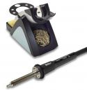 Preview: The image shows a soldering iron with a black cable and a soldering station. The station has a gray and black color scheme, a sponge, and a metal brush for cleaning the soldering iron.