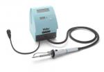 Preview: The image shows a light blue soldering station. It features a digital display, buttons, and a cable connected to a wooden soldering iron. The iron has a handle-like shape.