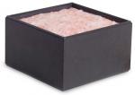 Preview: The image shows a black, square container with a soft, pink-colored content that looks like cotton. The surface is fluffy and uneven.