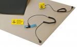 Preview: The image shows an ESD workstation mat in beige with a black cushion. Attached to it are a yellow ESD symbol and a cable with an ear clip and a connector.