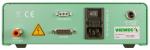 Preview: The image shows the back of a green device. It has various connections: for air supply, a foot switch, an I/O port, and a power connection. A safety sign is also visible.