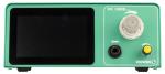 Preview: The image displays a device in mint green color. It features a large, black screen, a rotary knob, and two additional buttons, one of which is yellow. At the top, it reads 