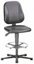 Preview: The image shows a black bar stool with a padded seat and backrest. It has an adjustable height and a round metal footrest. The stool is mounted on a stable base with casters.