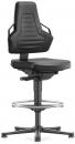 Preview: The image shows a black swivel chair with a high backrest and armrests. The seat is padded and the base has five casters. A foot ring complements the design.