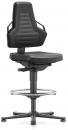 Preview: The image shows a black office chair with a high backrest and armrests. The seat is flat and the height is adjustable. It stands on five wheels and has a round foot ring.