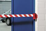 Preview: The image shows a blue door secured with a red-and-white barrier. In the background, a gray car is parked in front of the door. The adjacent wall is white.