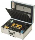 Preview: The image shows an opened metal case lined with foam inside. It contains a yellow device, as well as several tools and cables, neatly arranged.