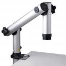 Preview: The image displays a flexible, silver arm of a swivel or projection device. It has distinct joints and a mount that is attached to a table.