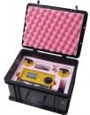 Preview: The image shows an open black suitcase with a yellow device and various accessories, surrounded by pink foam. The suitcase is sturdy and equipped for safe transport.